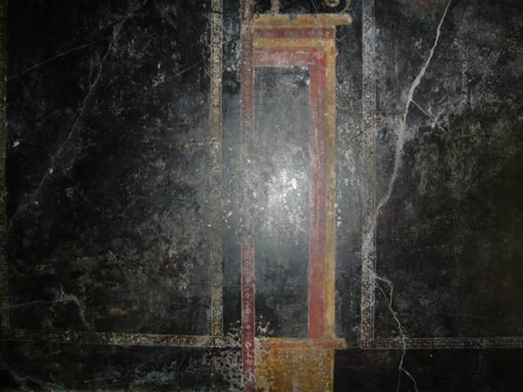 IX.13.1-3 Pompeii. May 2012.  Room 10, detail from east wall. Photo courtesy of Buzz Ferebee.
