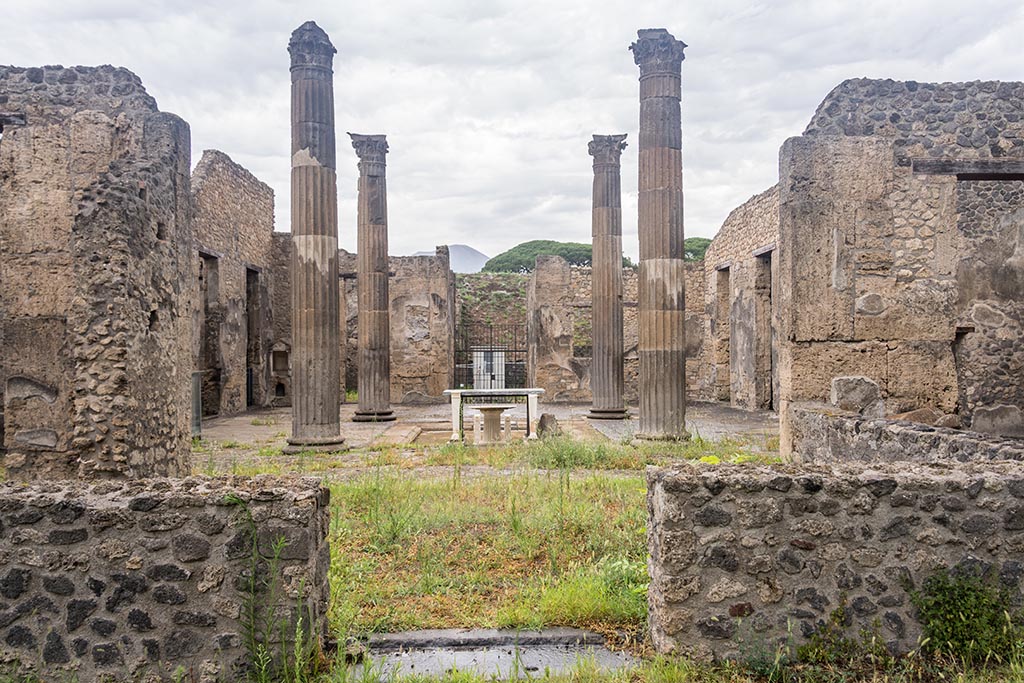 IX.14.4 Pompeii. July 2024. 
Looking north from portico, across tablinum towards entrance doorway and atrium. Photo courtesy of Johannes Eber.
