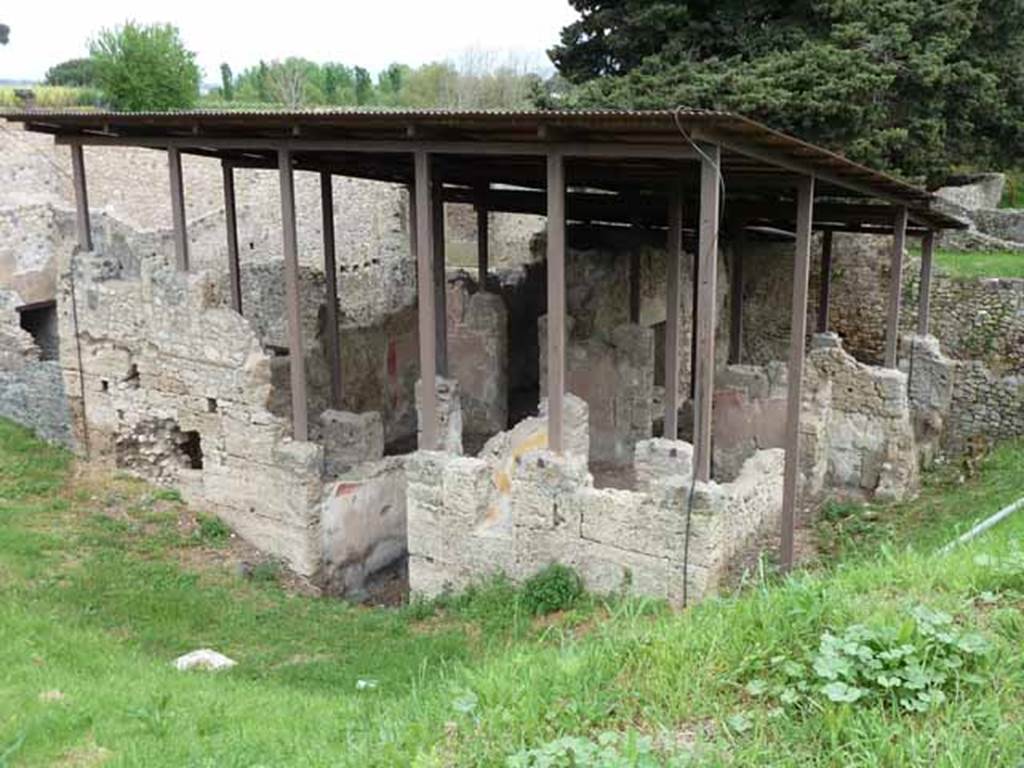 IX.14.c Pompeii. May 2010. Looking north-east. According to Spano, the construction of this house was very old. Its faade was formed entirely from large blocks of Sarno limestone. See Notizie degli Scavi di Antichit, 1911, p. 374.