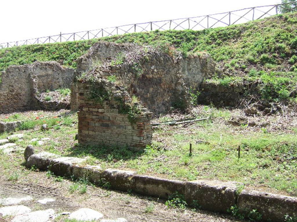 Via di Nola. South side. Looking east to junction with unnamed vicolo from III.10.6. May 2006.