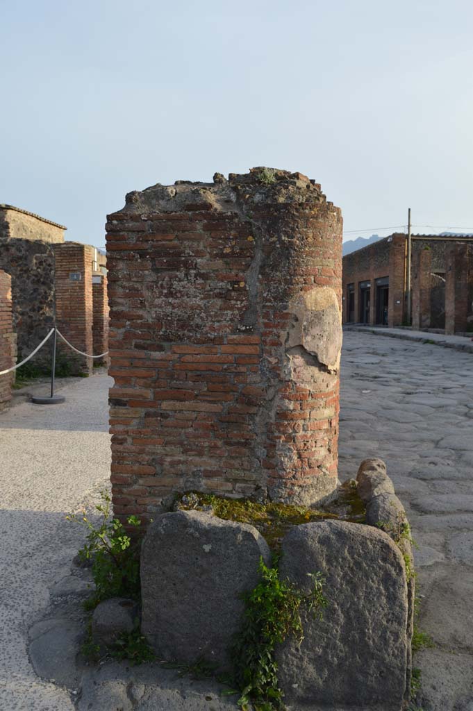Via del Foro, east side, Pompeii. March 2019. Looking south at north end pilaster/column base. 
Foto Taylor Lauritsen, ERC Grant 681269 DCOR.
