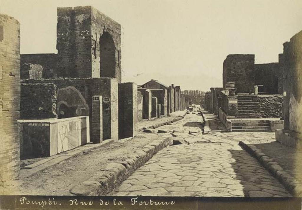 Via delle Terme. Undated photograph by Mauri, numbered 010.  Looking east towards Via della Fortuna, from between VI.8 and VII.5. Photo courtesy of Rick Bauer.
