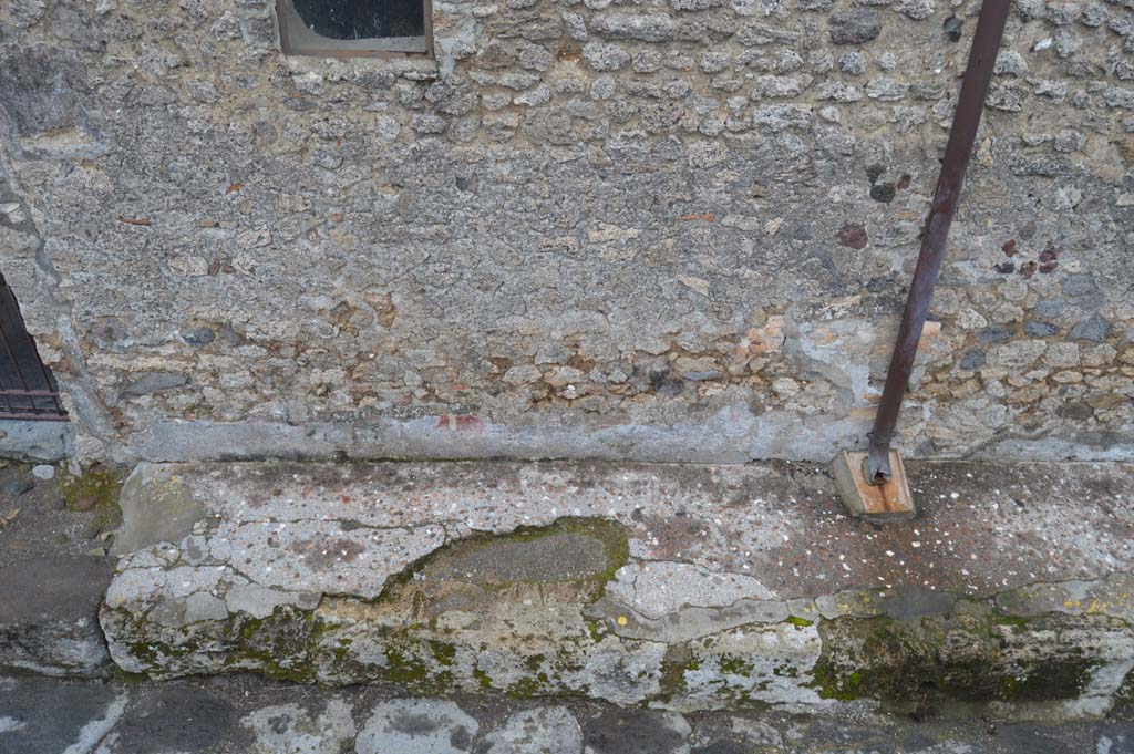 Vicolo della Fullonica, Pompeii. March 2018. Looking east, detail of remaining decoration on lower wall of VI.8.3. 
Foto Taylor Lauritsen, ERC Grant 681269 DÉCOR.
