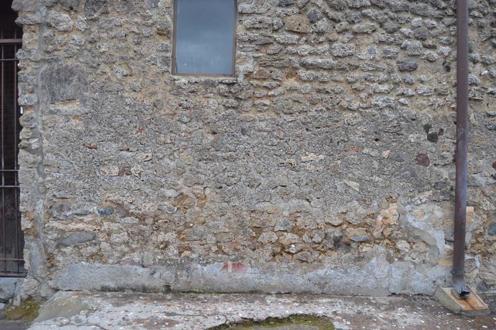 Vicolo della Fullonica, Pompeii. March 2018. Looking east, detail of remaining decoration on lower wall of VI.8.3. 
Foto Taylor Lauritsen, ERC Grant 681269 DÉCOR.

