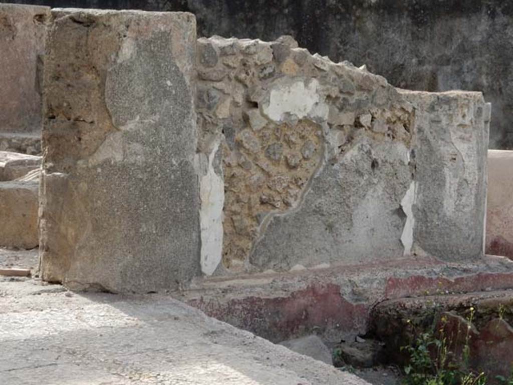 Tempio dionisiaco in località Sant’Abbondio di Pompei. May 2018. Columns and plaster on south end of west wall.
Photo courtesy of Buzz Ferebee.
