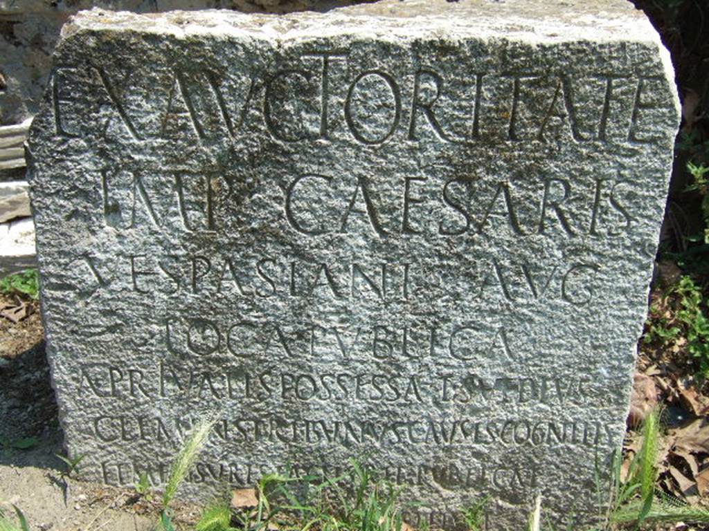 VGSC Pompeii Porta Vesuvio. May 2006. Cippus of Titus Suedius Clemens. 
The Cippus has a latin inscription reading -
Ex auctoritate 
imp(eratoris) Caesaris 
Vespasiani Aug(usti)
loca publica,
a privatis possessa T(itus) Suedius 
Clemens tribunus causis cognitis 
Et mensuris factis rei publicae
Pompeianorum restituit  
This translates as -
By virtue of authority conferred upon him by the Emperor Vespasian Caesar Augustus, 
Titus Suedius Clemens, tribune, having investigated the facts and taken measurements,
restored to the citizens of Pompeii public places illegally appropriated by private persons.
Similar Cippi were found at the Porta Ercolano, Porta Marina and the Porta Nocera.  The wording rei publicae Pompeianorum on one of these, discovered in 1763, was the first positive identification that the site was Pompeii.  Until then scholars had divided opinions on the city buried under Civita.  Many, including the first official excavators, thought it was the ancient city of Stabiae. See Conticello, B., Ed, 1990. Rediscovering Pompeii. Rome: LErma di Bretschneider. (p. 225).


