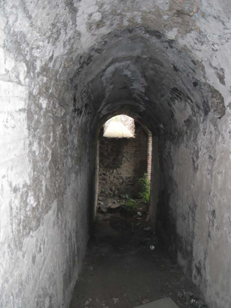 Tower V, Pompeii. May 2011. 
Corridor with lowered ceiling, looking towards arrow slit rendered ineffective. Photo courtesy of Ivo van der Graaff.
