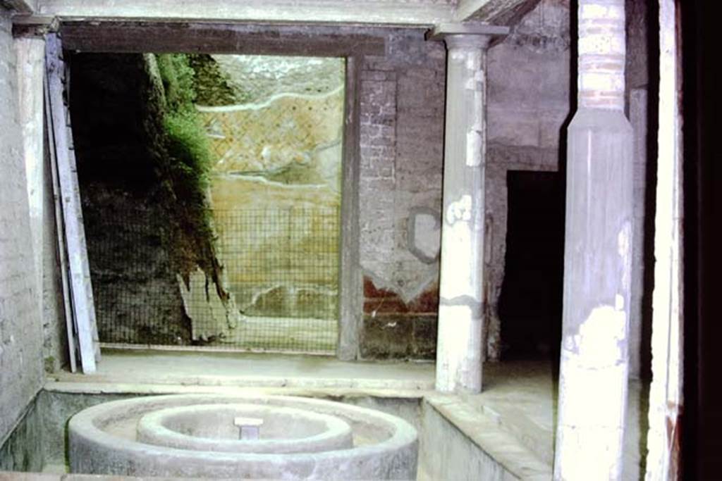 Oplontis, 1973. Tetrastyle atrium, a round fountain was placed in the very centre of the hallway, and it may have also worked as an impluvium. Photo by Stanley A. Jashemski. 
Source: The Wilhelmina and Stanley A. Jashemski archive in the University of Maryland Library, Special Collections (See collection page) and made available under the Creative Commons Attribution-Non Commercial License v.4. See Licence and use details. J73f0360
