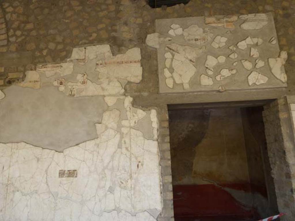 Oplontis, September 2011. Area 60, west portico wall with doorway to room 88. Looking west.  Photo courtesy of Michael Binns.