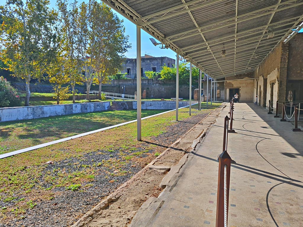 Oplontis Villa of Poppea, October 2023. 
Area 96, looking south-east across swimming pool from area 80, the east side of the west portico 60. Photo courtesy of Giuseppe Ciaramella. 
