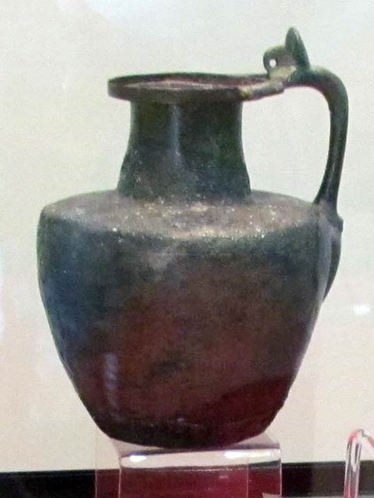 Gragnano, Villa rustica in Località Carmiano, Villa A. Bronze jug found in room 4.
Stabiae Antiquarium, inventory number 63377. 
Detail from photo courtesy of Donna Dollings.
