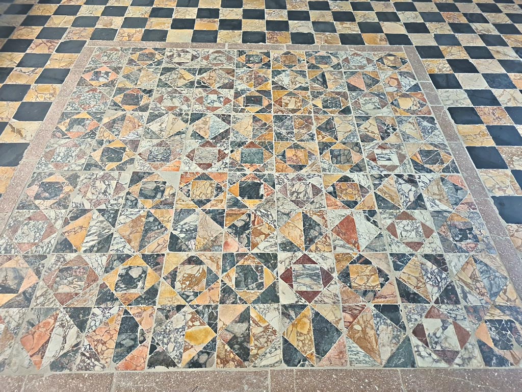 Opus Sectile floor on display in room CXLII on First floor in Naples Museum. June 2024. Photo courtesy of Giuseppe Ciaramella.
This has been taken from the other end of the mosaic from the above photo. 
